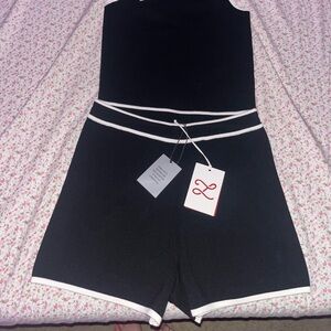 the cutest black and white two piece tank and shorts set by L’Academie 😍😍😍😍